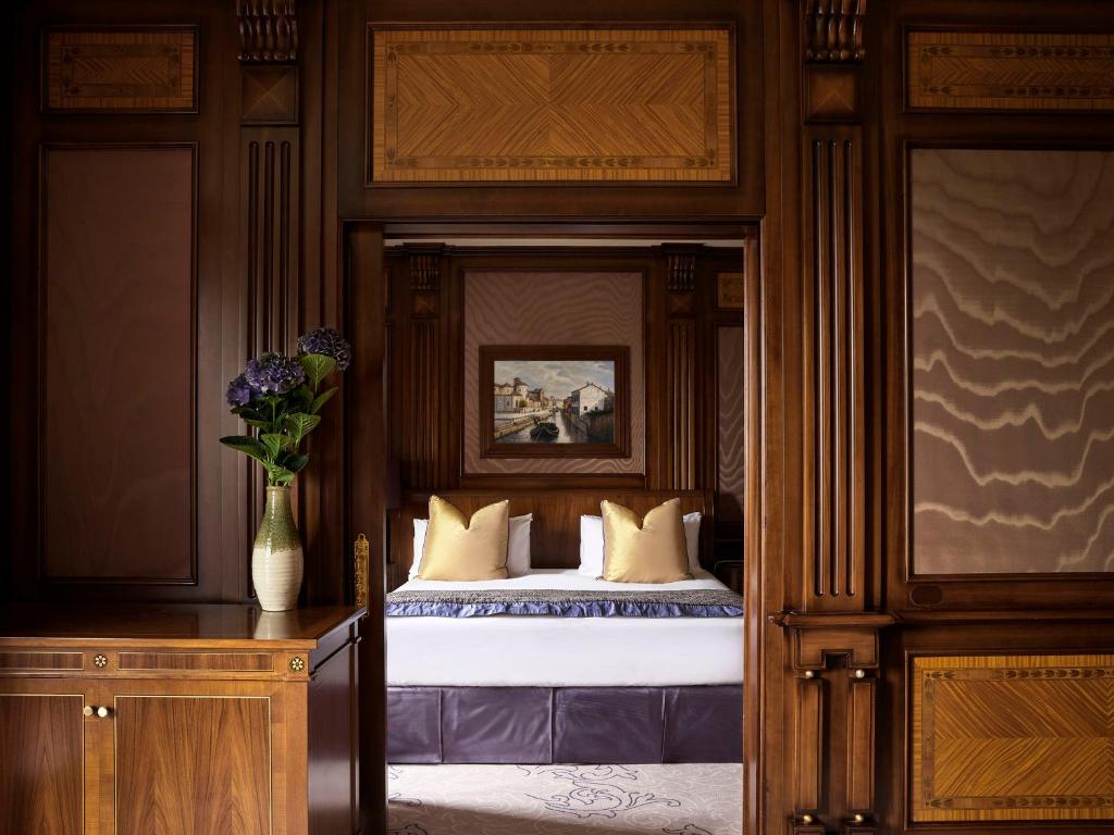 Postel nebo postele na pokoji v ubytování Hotel Principe Di Savoia - Dorchester Collection