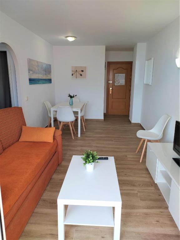 Posedenie v ubytovaní Apartamento 714 en edificio Stella Maris