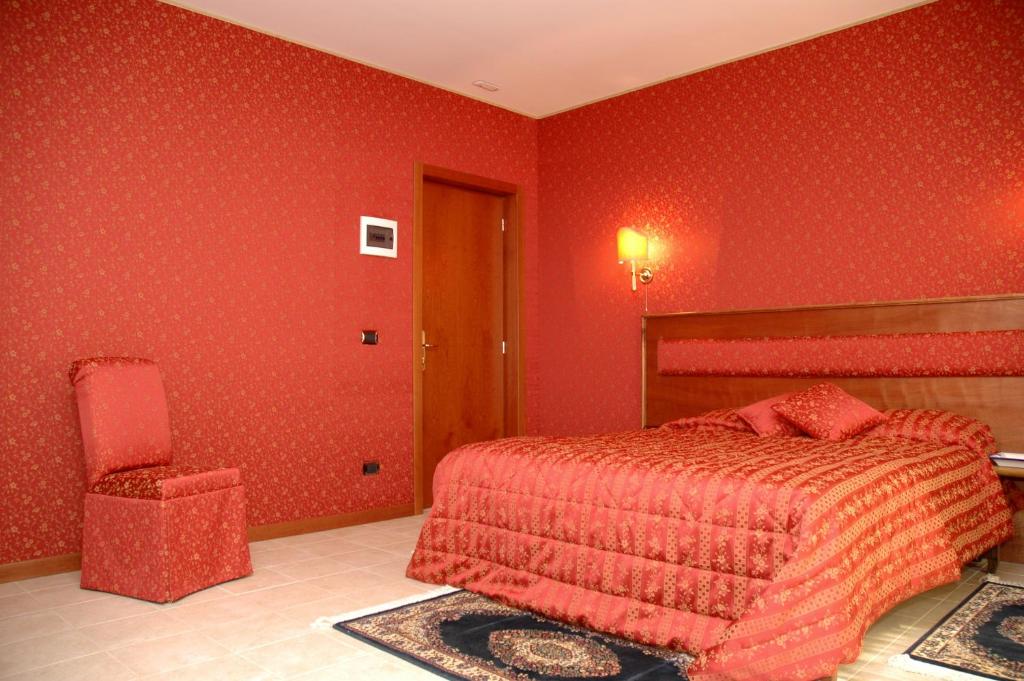 Postel nebo postele na pokoji v ubytování Hotel Shasa
