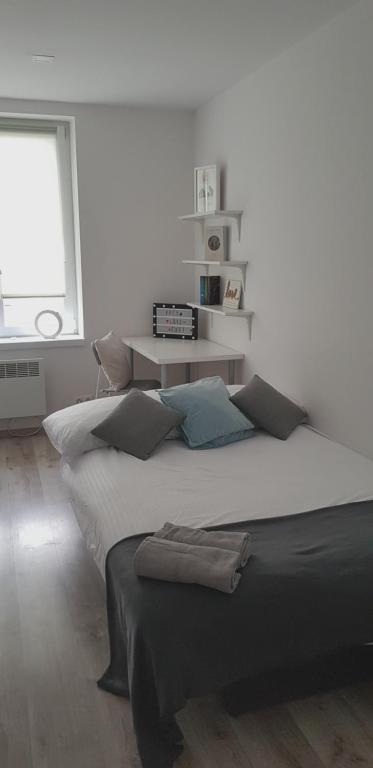 Posteľ alebo postele v izbe v ubytovaní Północna Rooms