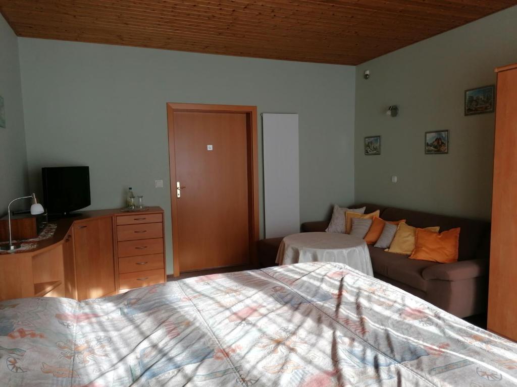 Postel nebo postele na pokoji v ubytování Ferienwohnung Fröhlich