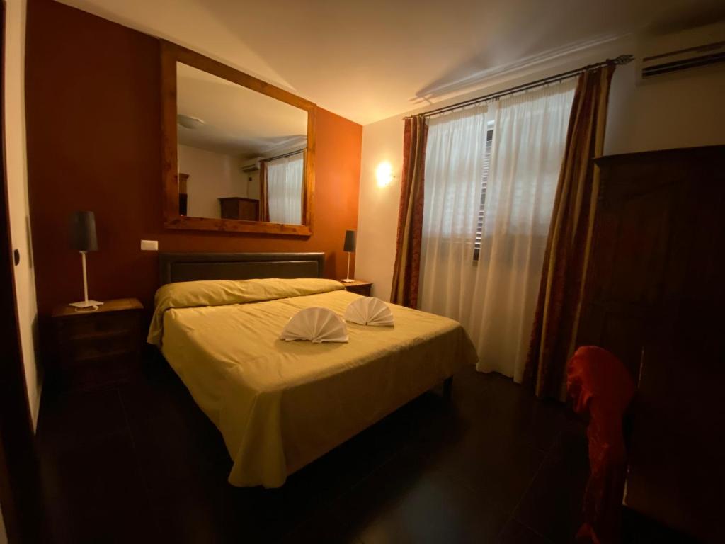 Postel nebo postele na pokoji v ubytování Park Hotel Serenissima