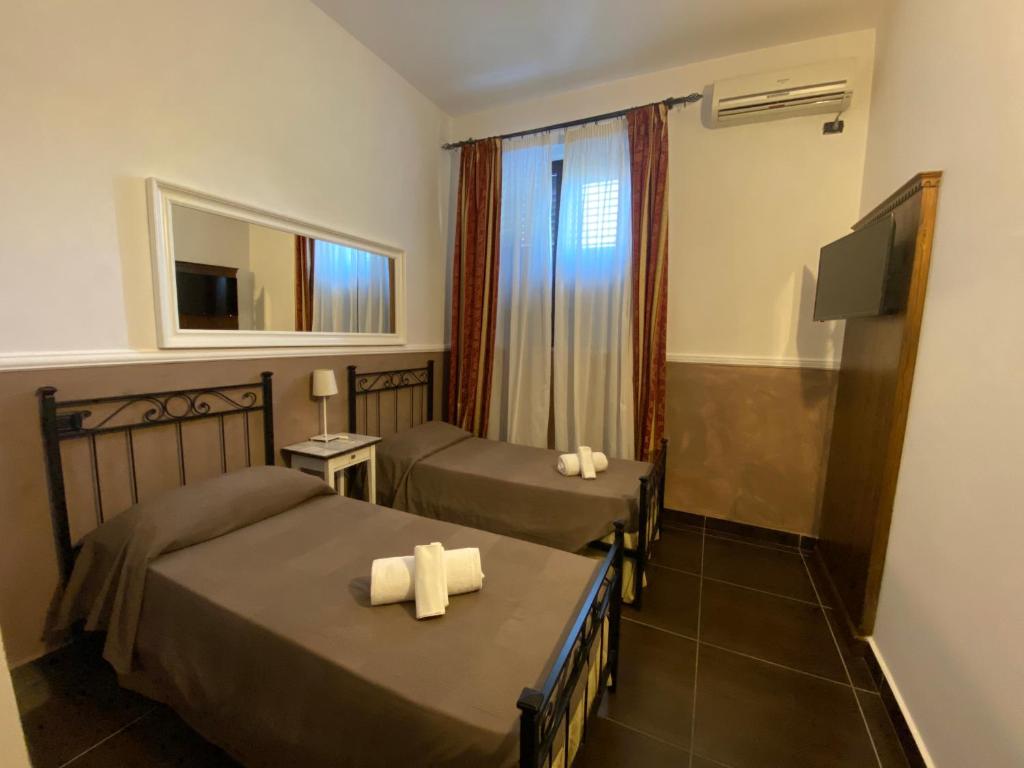 Postel nebo postele na pokoji v ubytování Park Hotel Serenissima