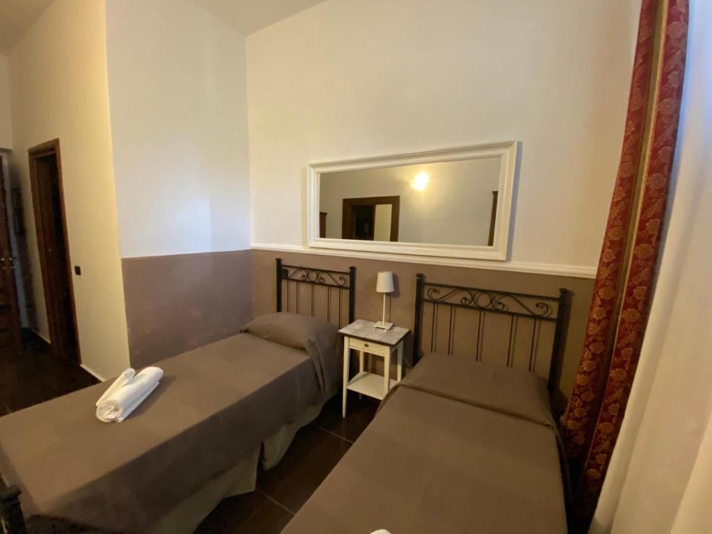 Postel nebo postele na pokoji v ubytování Park Hotel Serenissima