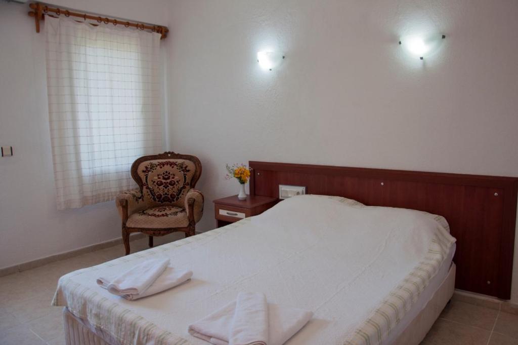 Postel nebo postele na pokoji v ubytování Makri Otel