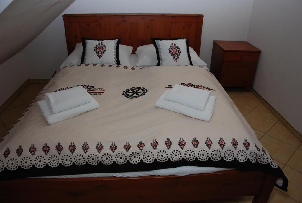 Posteľ alebo postele v izbe v ubytovaní Apartament Butorowy Kościelisko
