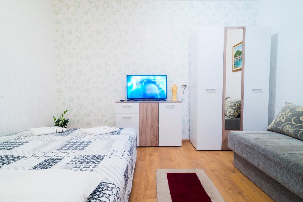 TV a/nebo společenská místnost v ubytování Apartmani Slavica