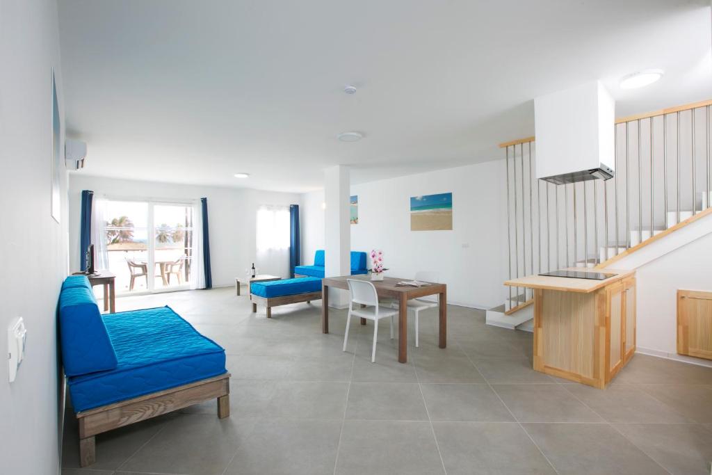 Postel nebo postele na pokoji v ubytování Halos Casa Resort
