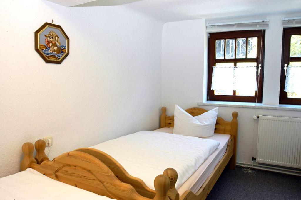 Postel nebo postele na pokoji v ubytování Pension Landhaus Machold