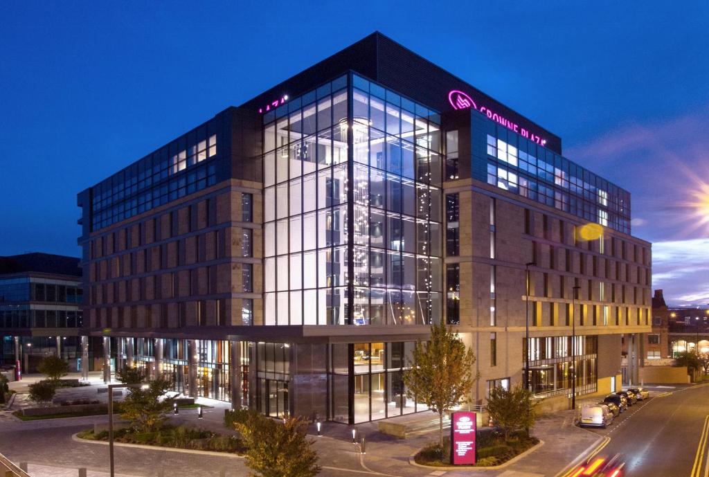a large building with a lot of windows at Crowne Plaza Newcastle - Stephenson Quarter, an IHG Hotel in Newcastle upon Tyne