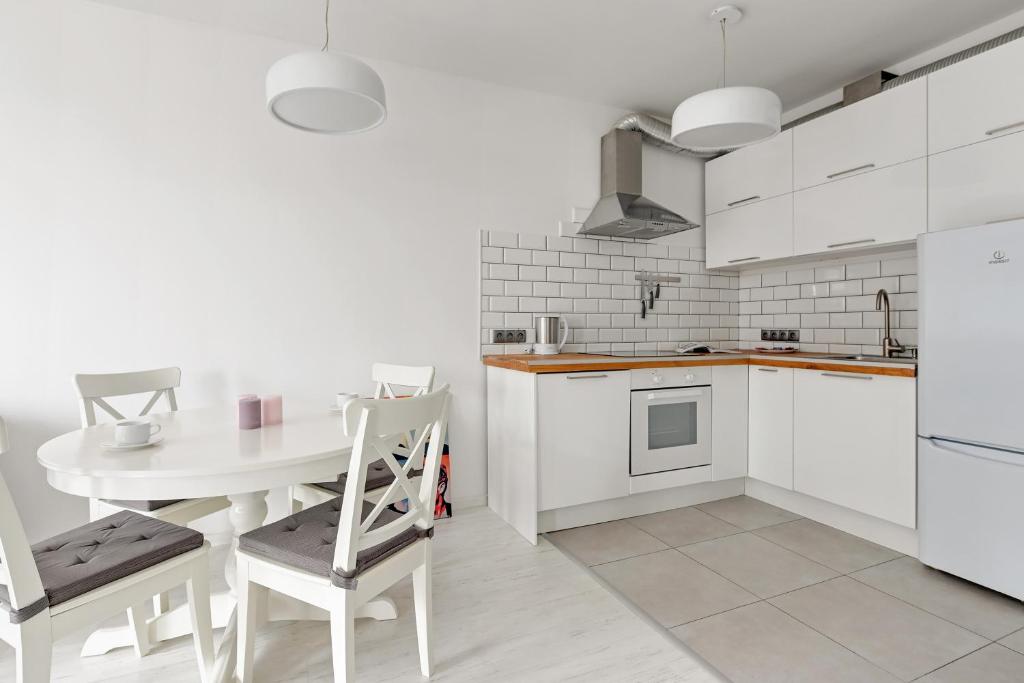 Kuchyň nebo kuchyňský kout v ubytování GRANO FLATS Gdańsk - Aura I