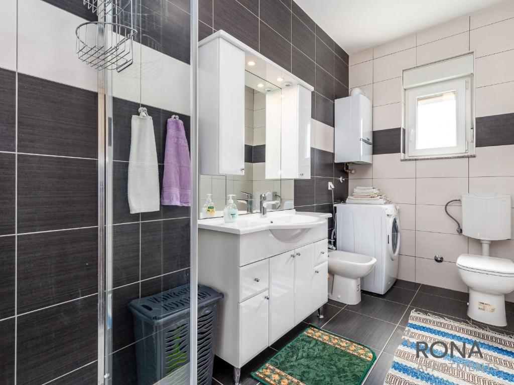 Kúpeľňa v ubytovaní Rona apartments Smokva