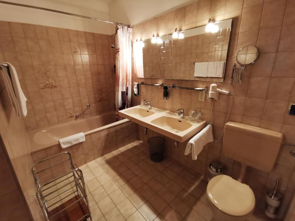 Koupelna v ubytování Hotel Bajazzo