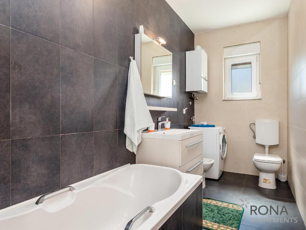 Kúpeľňa v ubytovaní Rona apartments Smokva