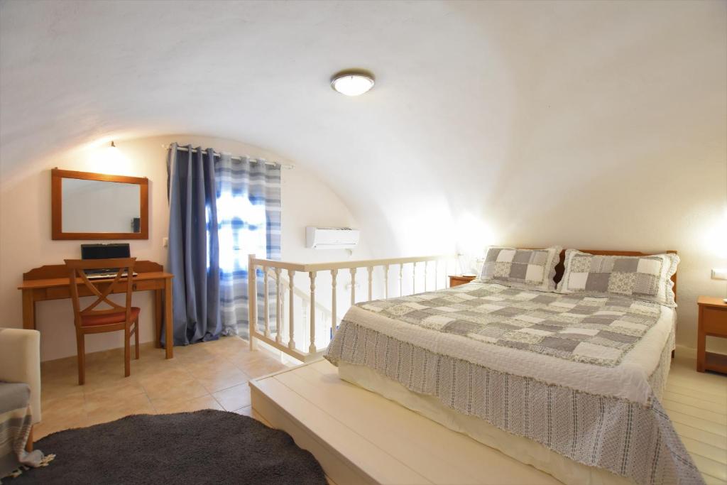 Postel nebo postele na pokoji v ubytování Rodakas Hotel
