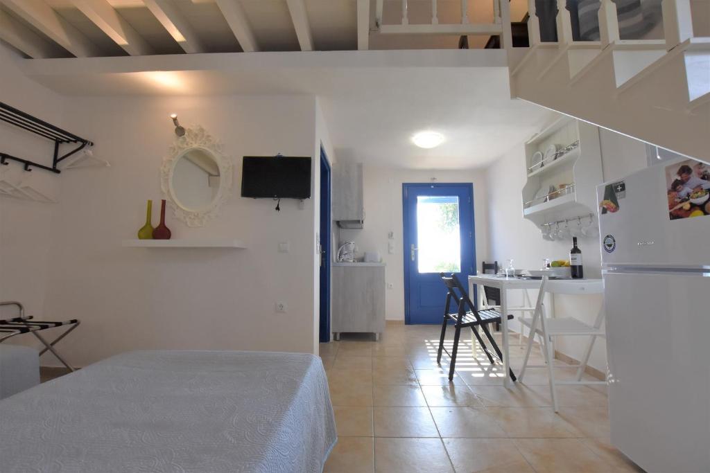 Postel nebo postele na pokoji v ubytování Rodakas Hotel