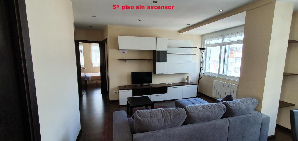 A kitchen or kitchenette at Coqueto apartamento de 2 habitaciones en zona estación tren