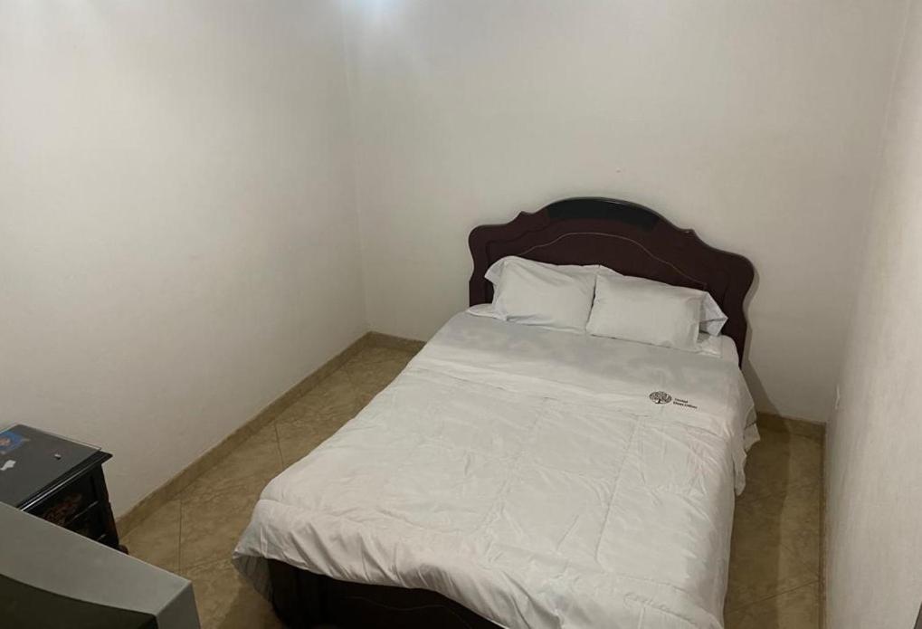 Postel nebo postele na pokoji v ubytování Hotel Don Olivo