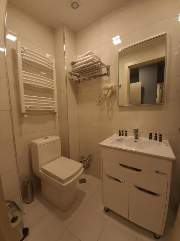 Koupelna v ubytování BG Palace Hotel