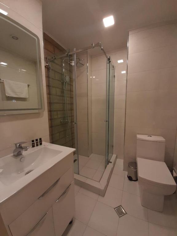Koupelna v ubytování BG Palace Hotel