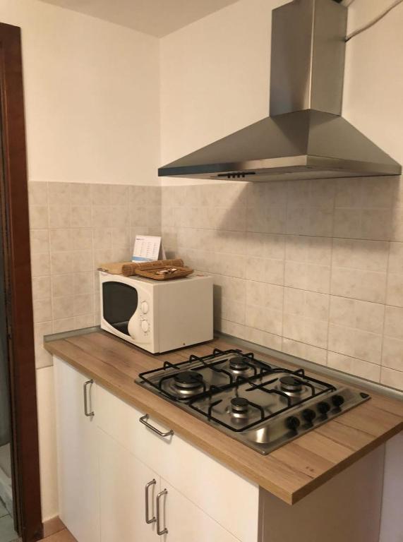 Kuchyňa alebo kuchynka v ubytovaní Casa Vacanze Giorgetta 2-3 piano