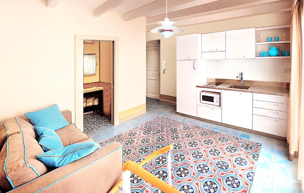 Kuchyňa alebo kuchynka v ubytovaní Cala del Porto Residence