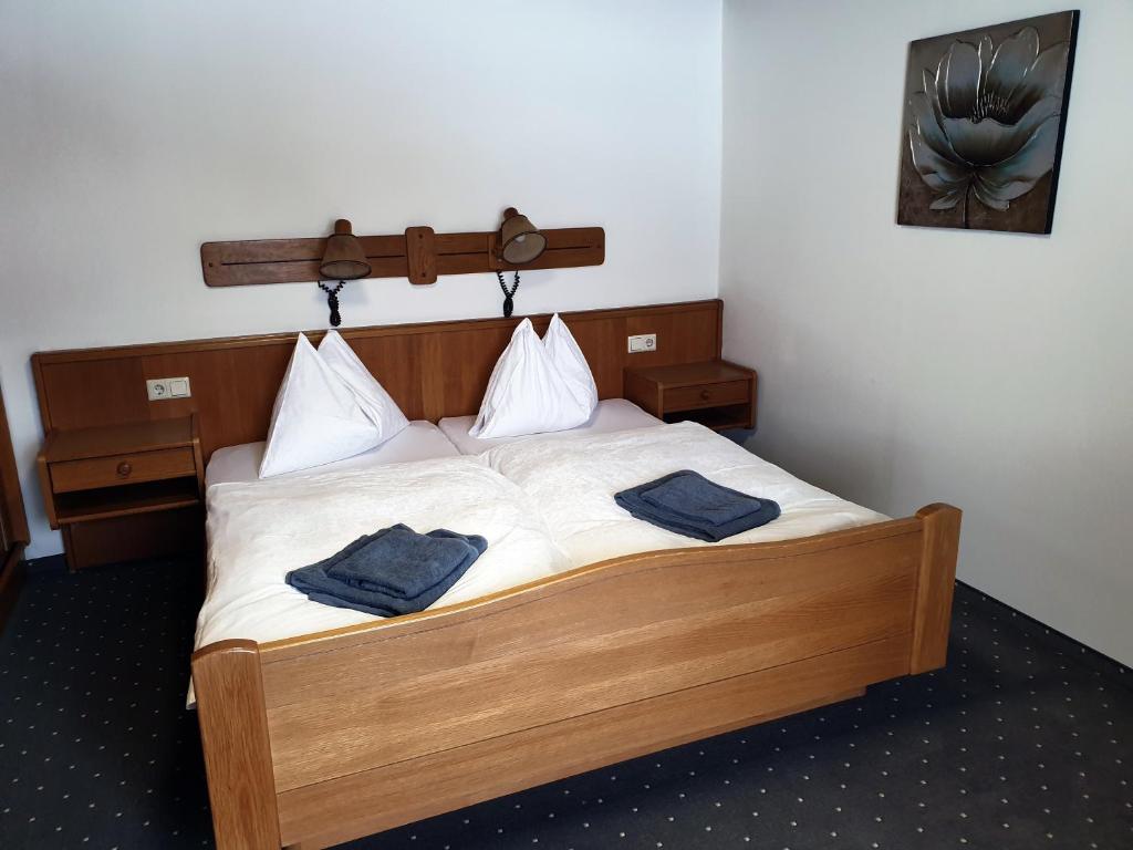 Postel nebo postele na pokoji v ubytování Landgasthof Hotel Zehenthof