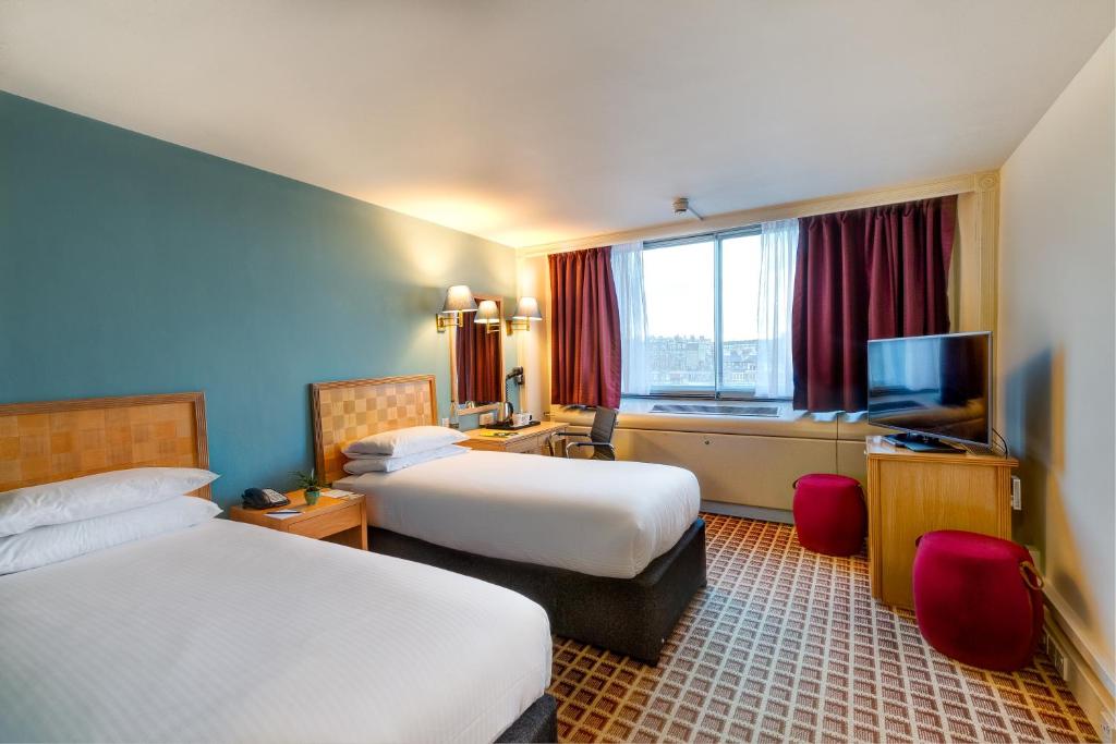 Postel nebo postele na pokoji v ubytování Copthorne Tara Hotel London Kensington