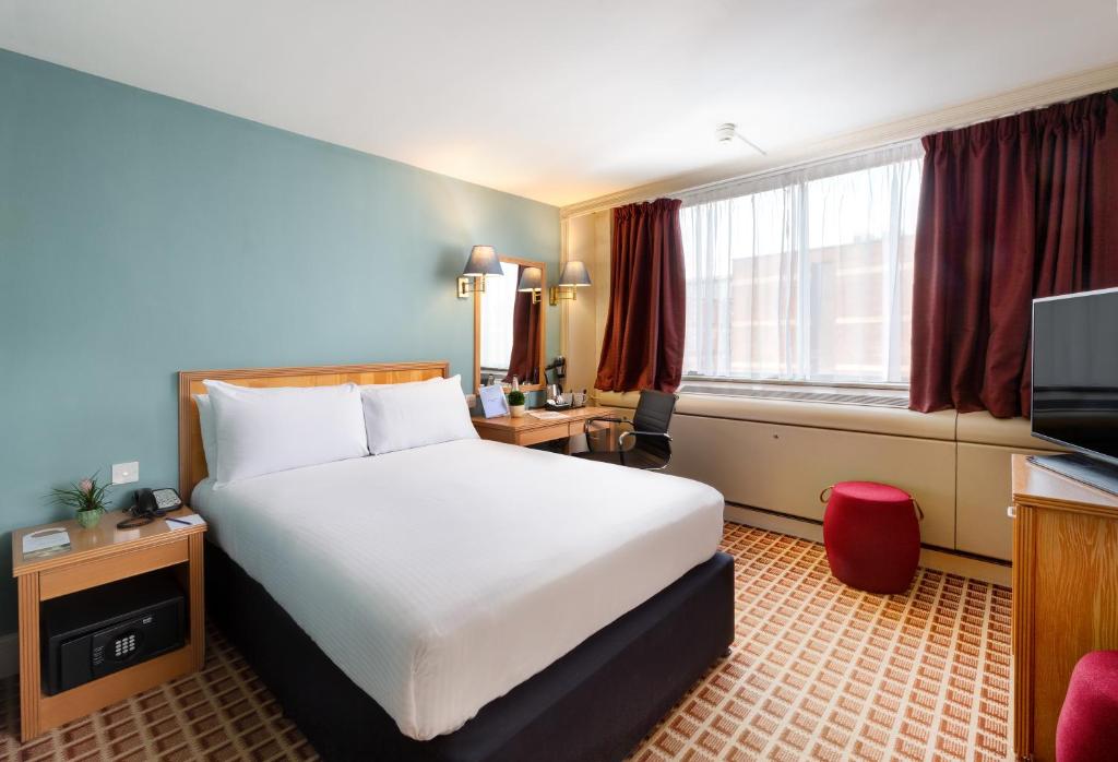 Postel nebo postele na pokoji v ubytování Copthorne Tara Hotel London Kensington