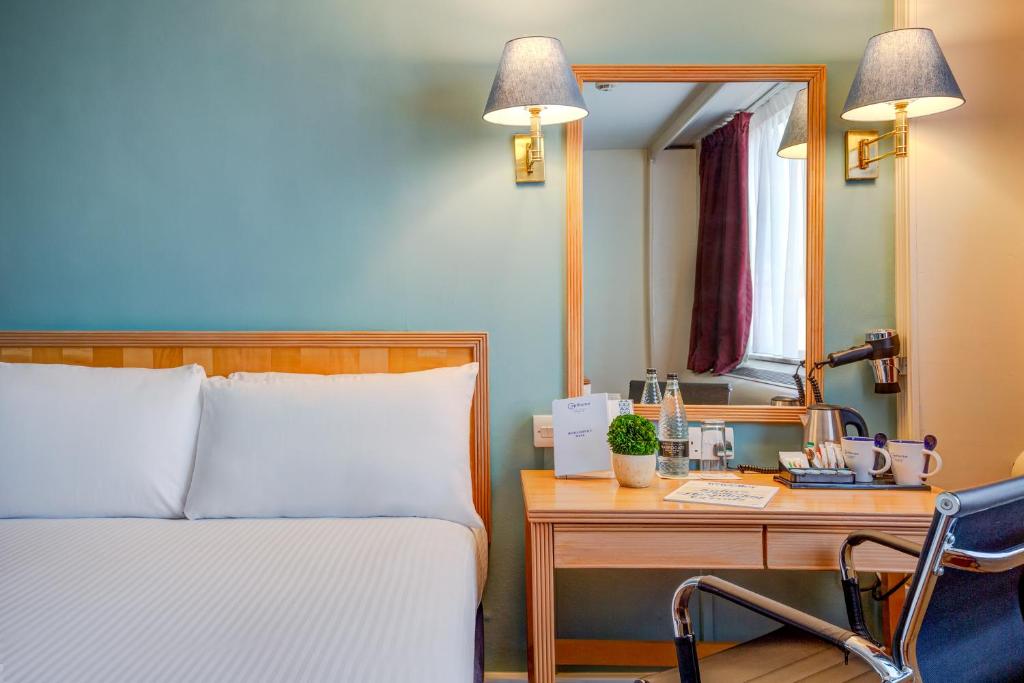 Postel nebo postele na pokoji v ubytování Copthorne Tara Hotel London Kensington
