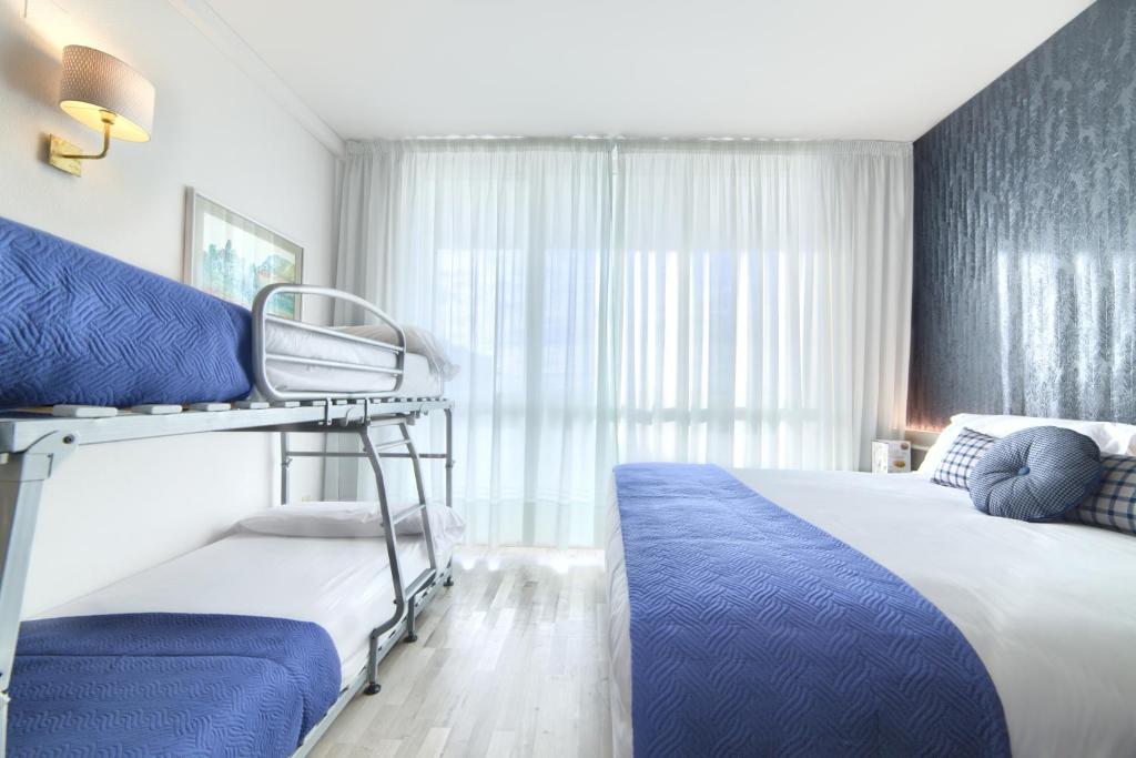 Postel nebo postele na pokoji v ubytování Hotel Luze El Villa