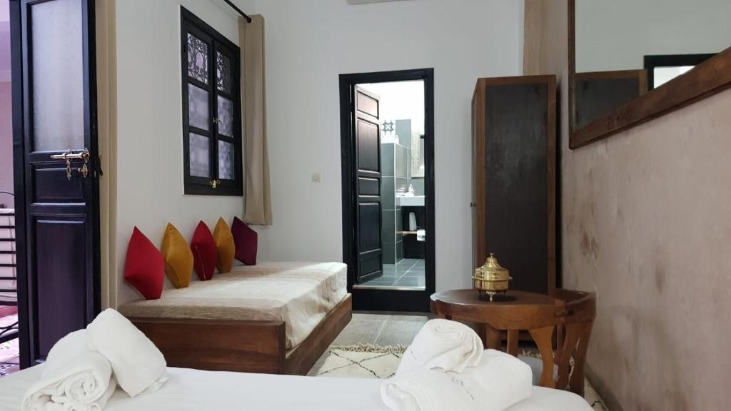 Letto o letti in una camera di Riad le Voile d'Orient