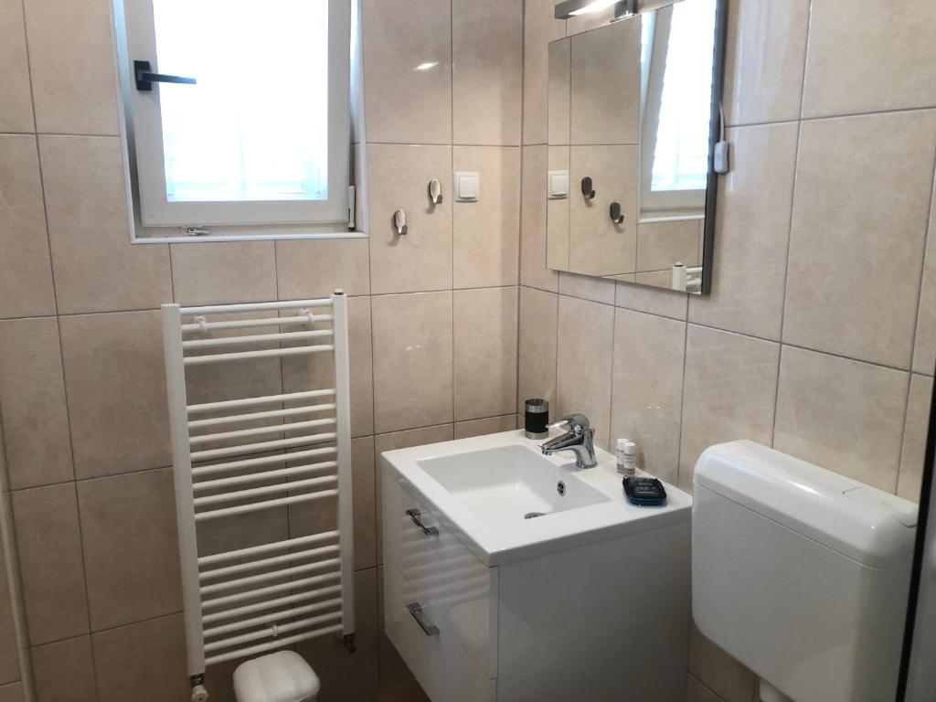 Koupelna v ubytování Apartments Mikelic