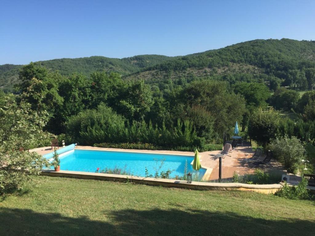 Der Swimmingpool an oder in der Nähe von Villa le Prieuré du Lot, proche Sarlat