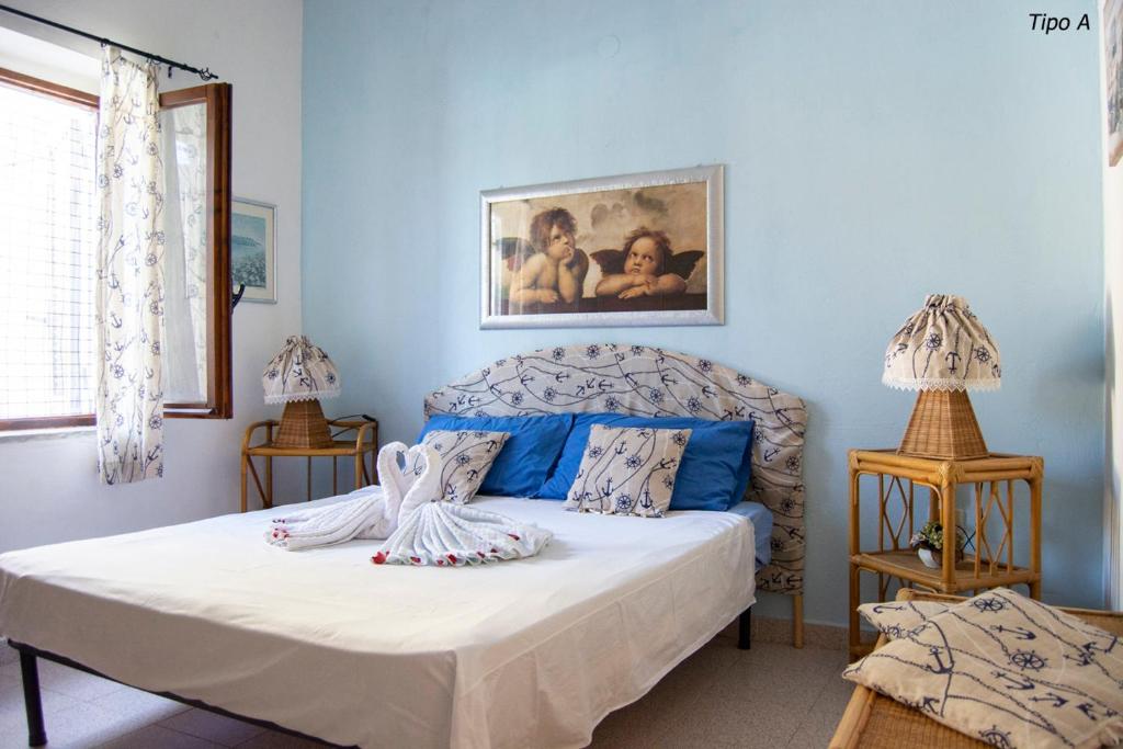 A bed or beds in a room at Casa Vacanze Villa Francy