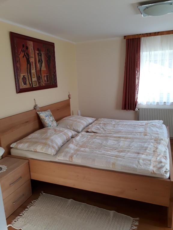 Postel nebo postele na pokoji v ubytování Schlagerberg