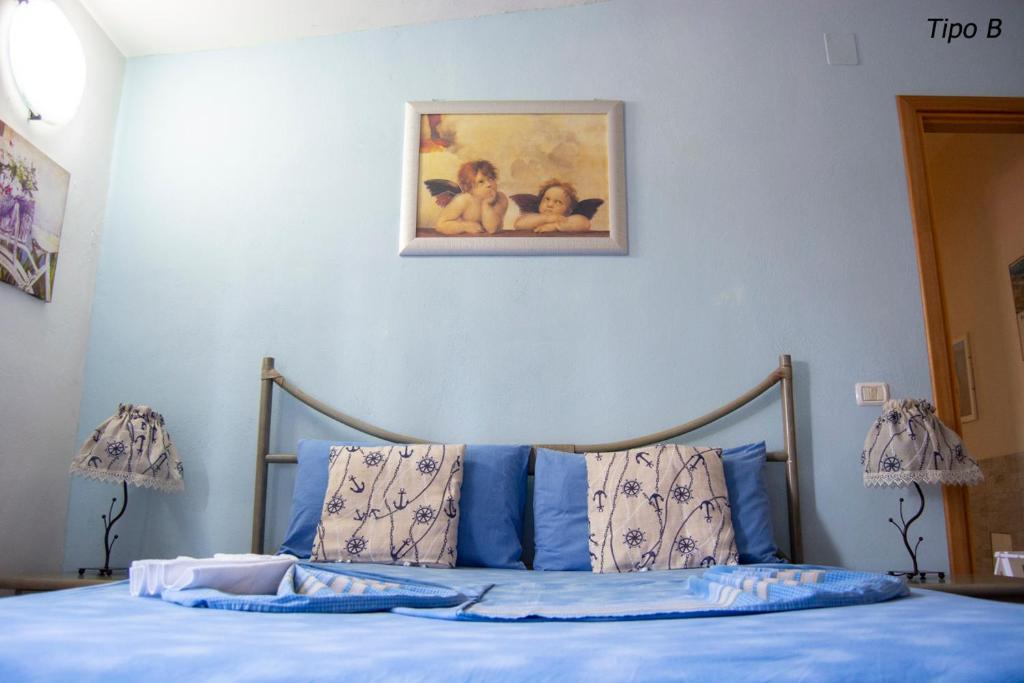 A bed or beds in a room at Casa Vacanze Villa Francy