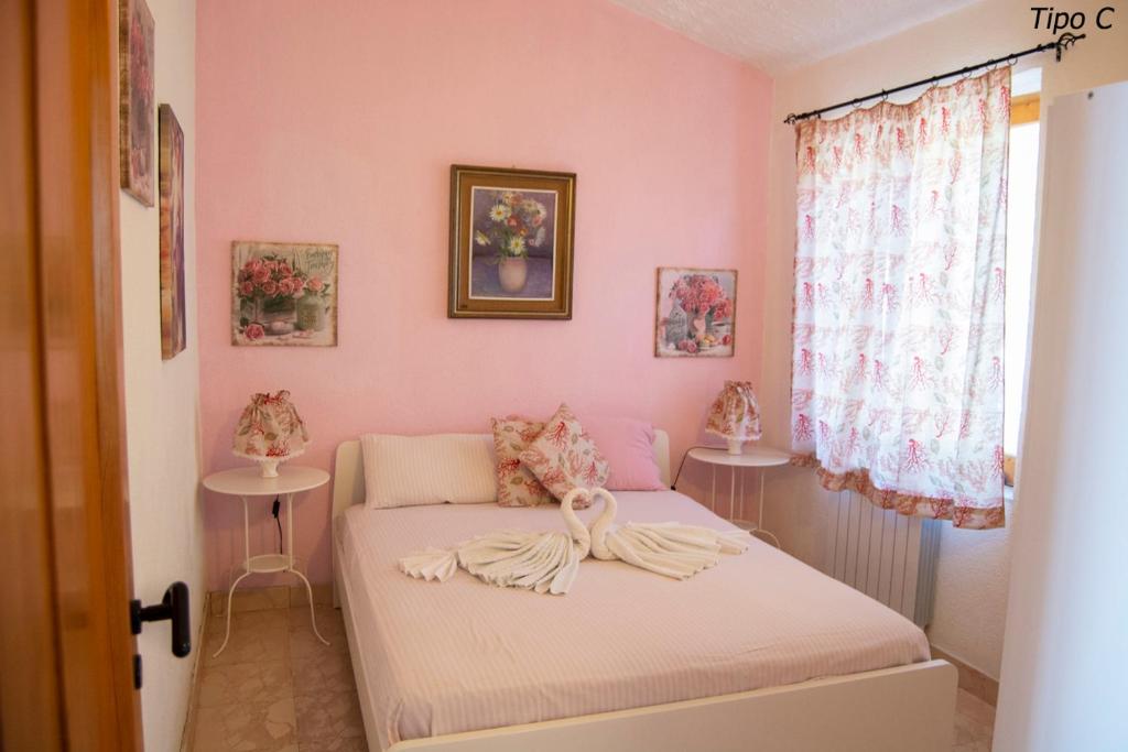 A bed or beds in a room at Casa Vacanze Villa Francy