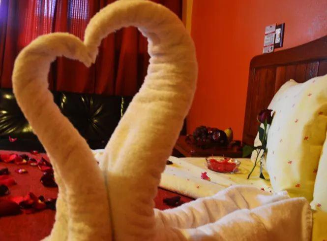 Postel nebo postele na pokoji v ubytování Hotel Márquez