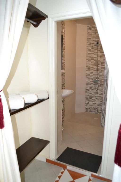 Koupelna v ubytování Hotel Cap Sim