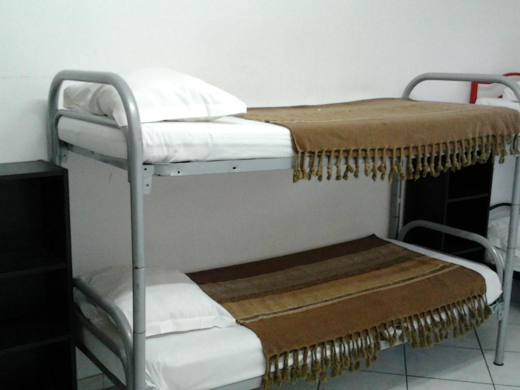 Postel nebo postele na pokoji v ubytování Star Hostel