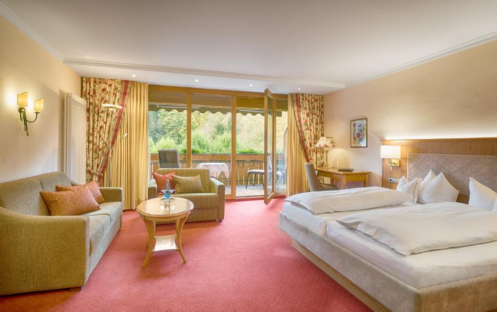 Postel nebo postele na pokoji v ubytování Hotel Thomahof
