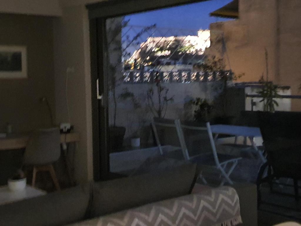 Posedenie v ubytovaní Super Loft With Acropolis View