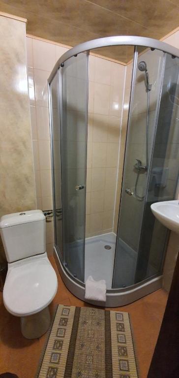 Koupelna v ubytování Dovbushanka Hotel