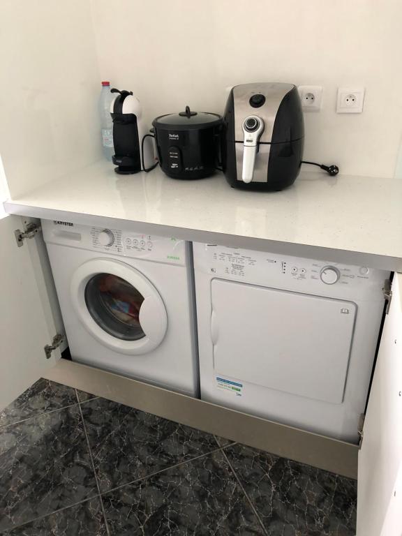 Kuchyň nebo kuchyňský kout v ubytování Cool Home