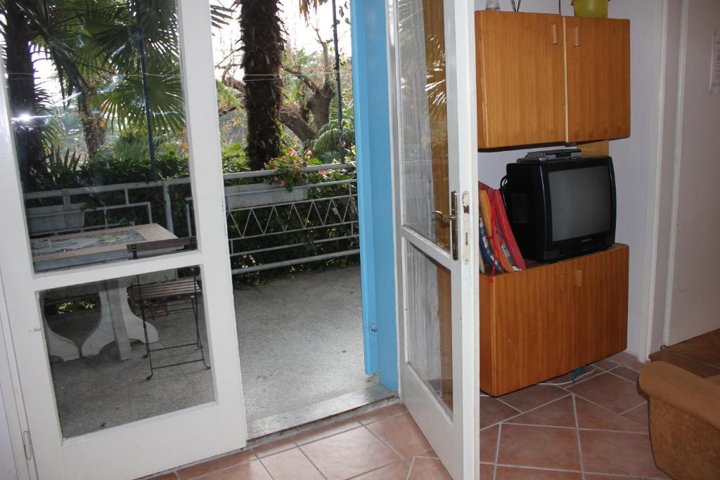 Kuchyň nebo kuchyňský kout v ubytování Apartments Sabadin