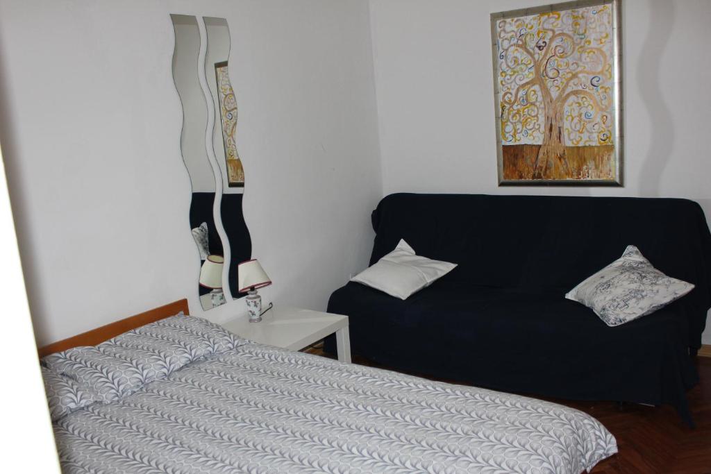 Postel nebo postele na pokoji v ubytování Apartments Sabadin
