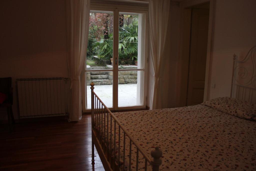 Postel nebo postele na pokoji v ubytování Apartments Sabadin