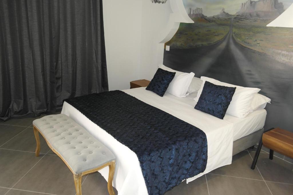 Postel nebo postele na pokoji v ubytování Aparthotel Palace