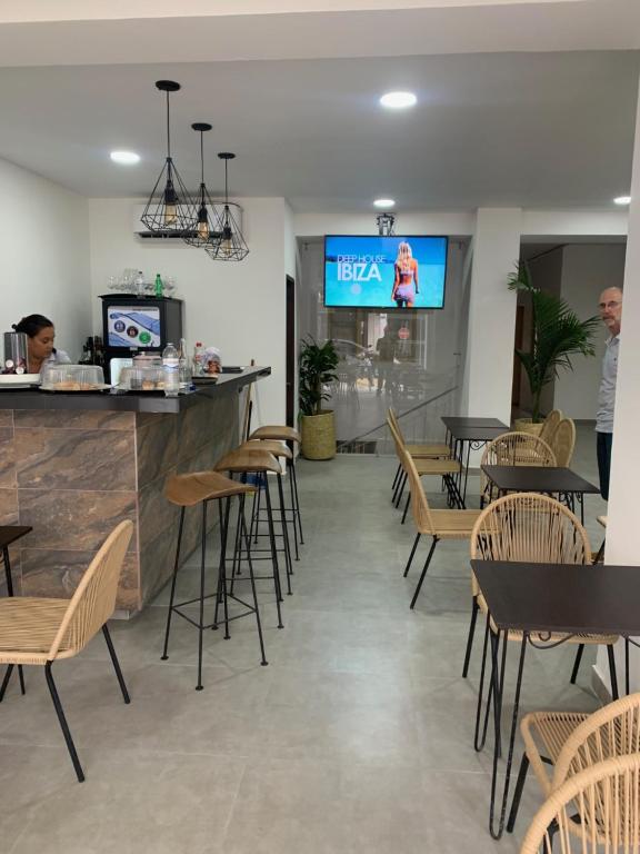TV a/nebo společenská místnost v ubytování Hotel Viena